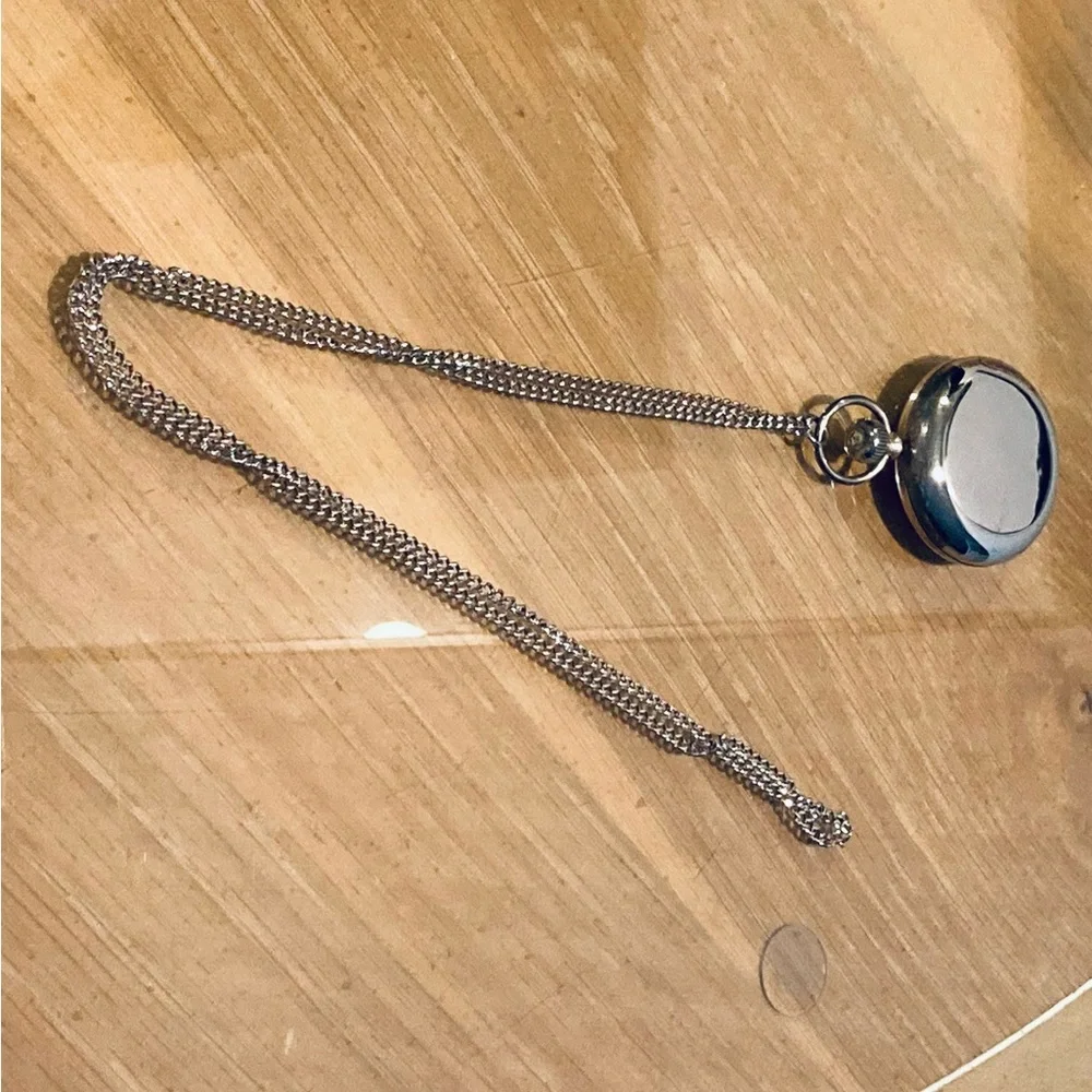 Estee Lauder pocket watch
